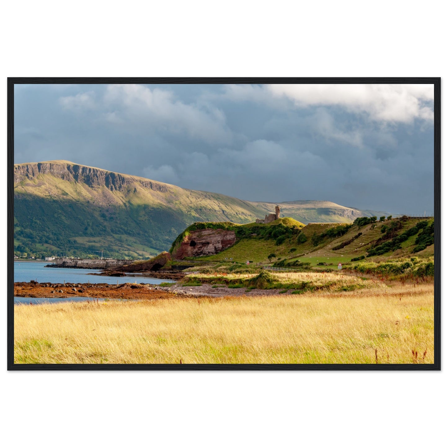 This mesmerising artwork captures the rugged beauty of one of the world's most scenic drives, the Causeway Coastal Route (A2), with a focal point on the medieval marvel, Red Bay Castle.