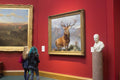 The Monarch of the Glen by Edwin Landseer, 1851 — a twelve-point red deer stag turning its head in Highland mist