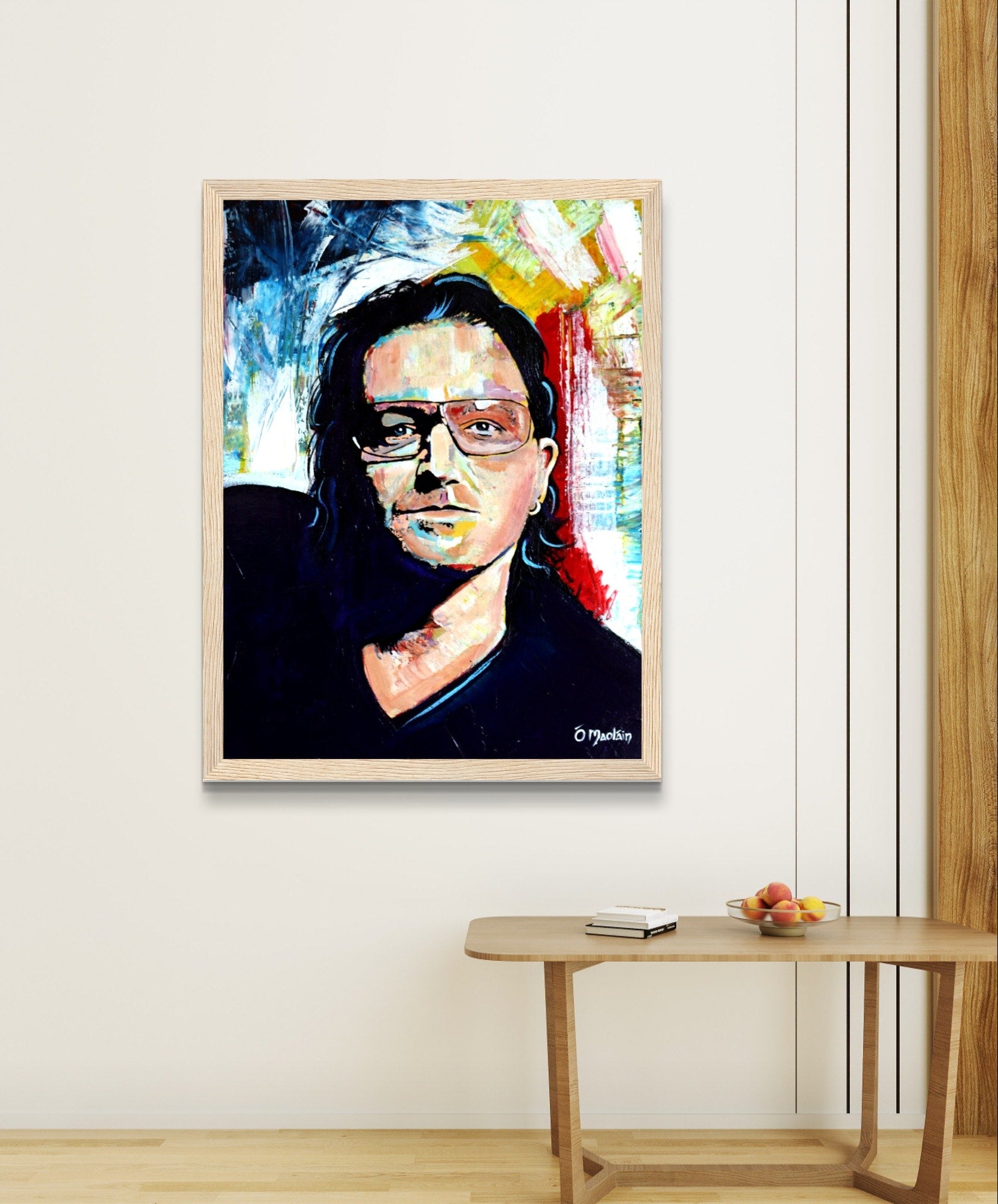 Vibrant, colorful framed wall art print of Bono from U2 by Irish artist Ó Maoláin. Capturing Bono's iconic stage presence, this dynamic portrait adds rock 'n' roll flair to any space. A perfect statement piece for U2 fans, blending music and art seamlessly.