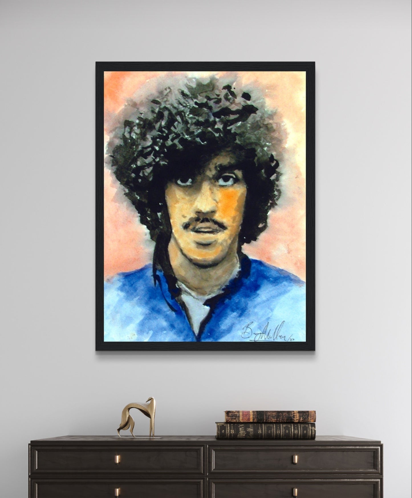 Framed art print of Phil Lynott, iconic Thin Lizzy frontman. Detailed portrait by Irish artist, celebrating rock band's 70s-80s heavy metal influence. Ideal for music fans and collectors of Irish art.