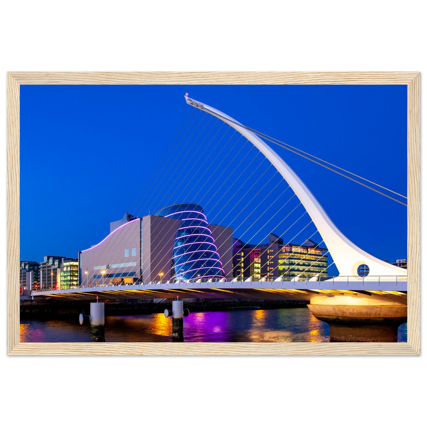 Enchanting Dublin skyline at night: Samuel Beckett Bridge & Convention Centre lights reflected on River Liffey. Framed art print captures city's magic.