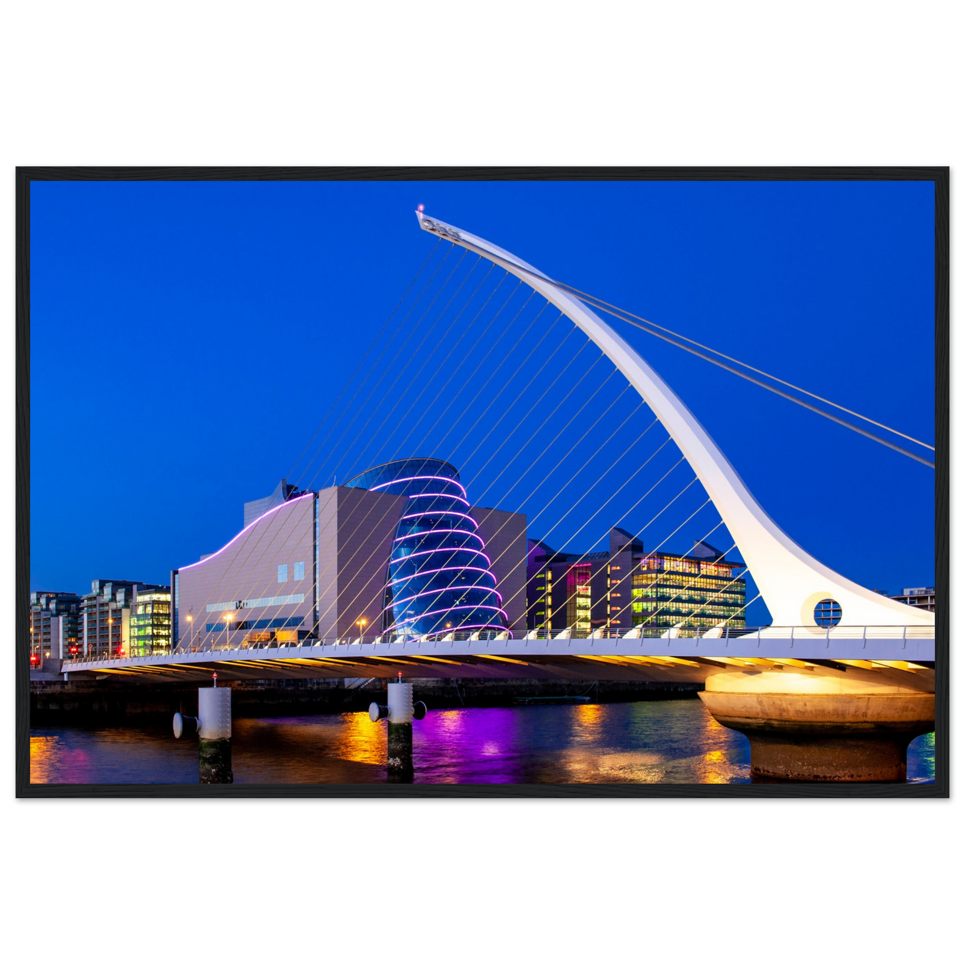 Enchanting Dublin skyline at night: Samuel Beckett Bridge & Convention Centre lights reflected on River Liffey. Framed art print captures city's magic.